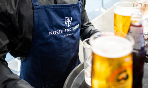 Experience Maker in the branded North Event Events apron